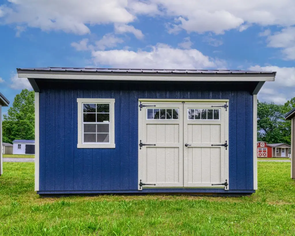 Painted Cabin, blue portable storage building